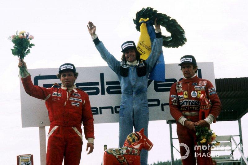 Podium: second place Jochen Mass, McLaren, Race winner Jacques Laffite, Ligier, third place Carlos Reutemann, Ferrari