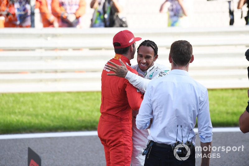 Lewis Hamilton, Mercedes AMG F1, congratulates Charles Leclerc, Ferrari, on securing pole