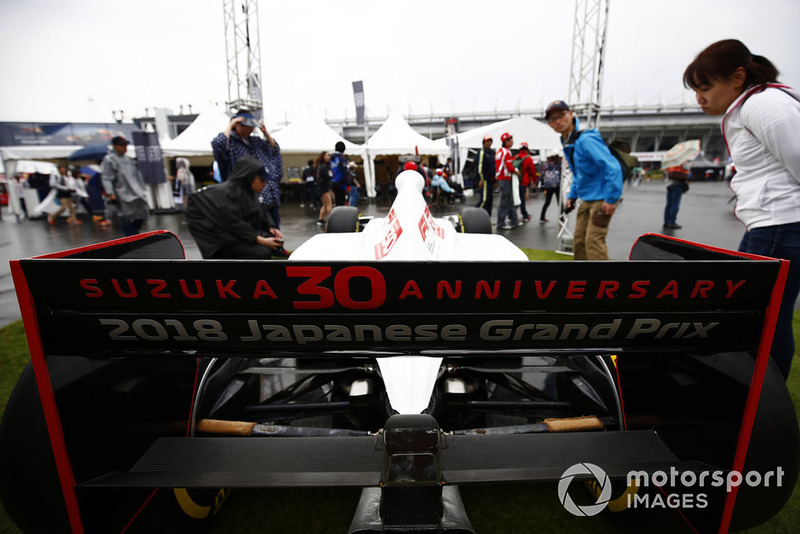 Fans admire a specially liveried 30th anniversary car