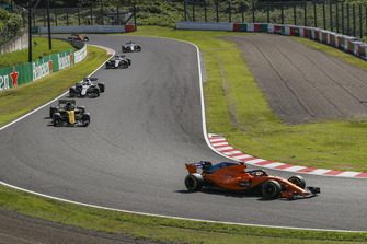 Fernando Alonso, McLaren MCL33 leads Nico Hulkenberg, Renault Sport F1 Team R.S. 18 and Lance Stroll, Williams FW41