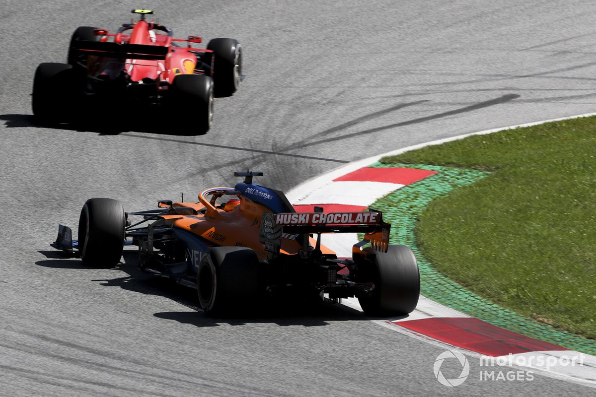 Charles Leclerc, Ferrari SF1000, leads Carlos Sainz Jr., McLaren MCL35
