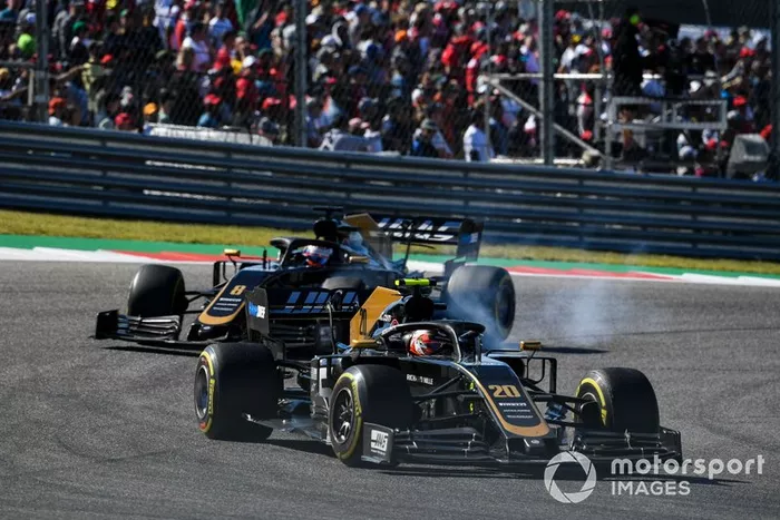 Kevin Magnussen, Haas VF-19 Team, leads Romain Grosjean, Haas VF-19 Team
