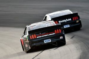 Aric Almirola, Stewart-Haas Racing, Ford Mustang Smithfield and Garrett Smithley, Rick Ware Racing, Chevrolet Camaro