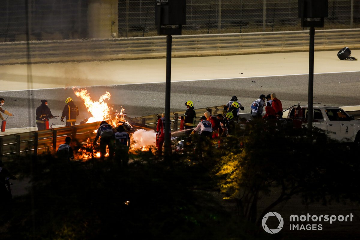 The crashed car of Romain Grosjean, Haas VF-20 on fire