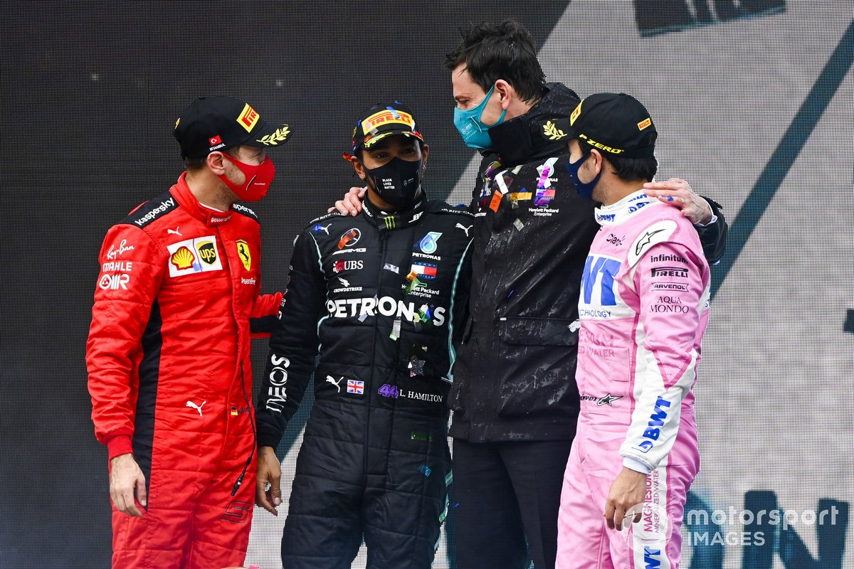 Sebastian Vettel, Ferrari, 3rd position, Lewis Hamilton, Mercedes-AMG F1, 1st position, Toto Wolff, Executive Director (Business), Mercedes AMG, and Sergio Perez, Racing Point, 2nd position, on the podium