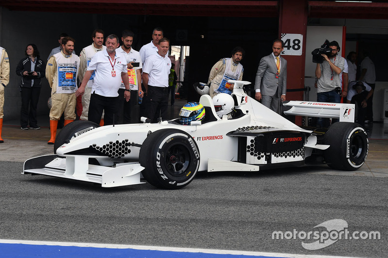 Zsolt Baumgartner, F1 Experiences 2-Seater driver and F1 Experiences 2-Seater passenger Thomas Senecal, Journalist and Presenter for Canal