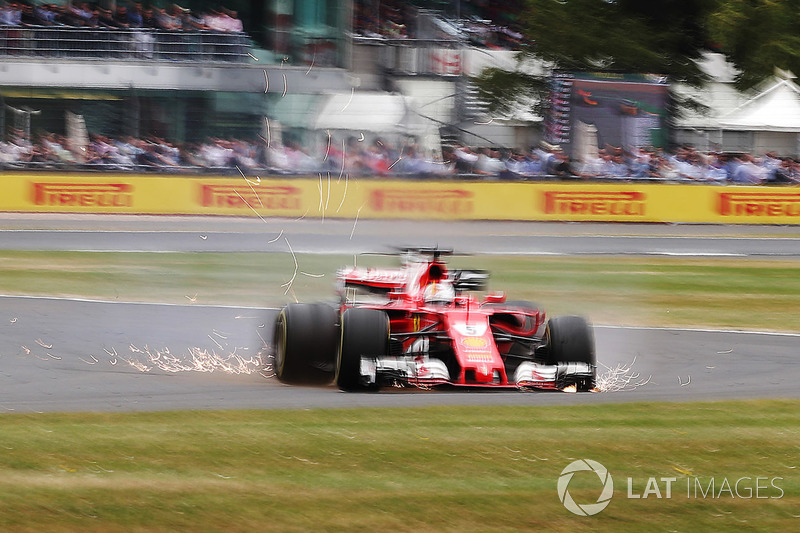 Sebastian Vettel, Ferrari SF70H, runs off the road with a front puncture