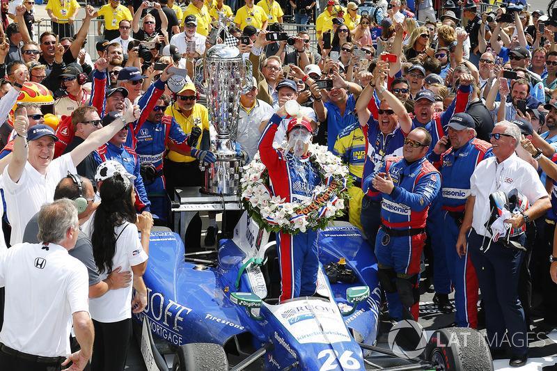 Takuma Sato, Andretti Autosport Honda celebrates with milk in victory lane