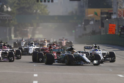 Lewis Hamilton, Mercedes AMG F1 W08, Felipe Massa, Williams FW40, passes Sebastian Vettel, Ferrari S