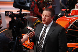 Zak Brown, Executive Director of McLaren Technology Group, is interviewed by the media