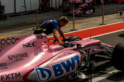 The car of Esteban Ocon, Sahara Force India VJM10 is pushed down pitlane by a Sahara Force India mechanic