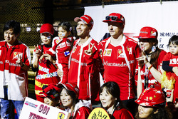 Sebastian Vettel, Ferrari, Kimi Raikkonen, Ferrari, on the stage in the F1 Fanzone