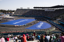 Safety car leads the field