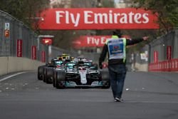 Lewis Hamilton, Mercedes-AMG F1 W09 EQ Power+ and marshal