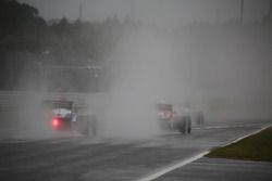 Track action under heavy rain