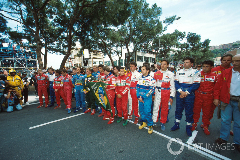 The drivers pay tribute to Ayrton Senna before the race start