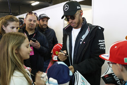 Lewis Hamilton, Mercedes AMG F1, meets the grid kids