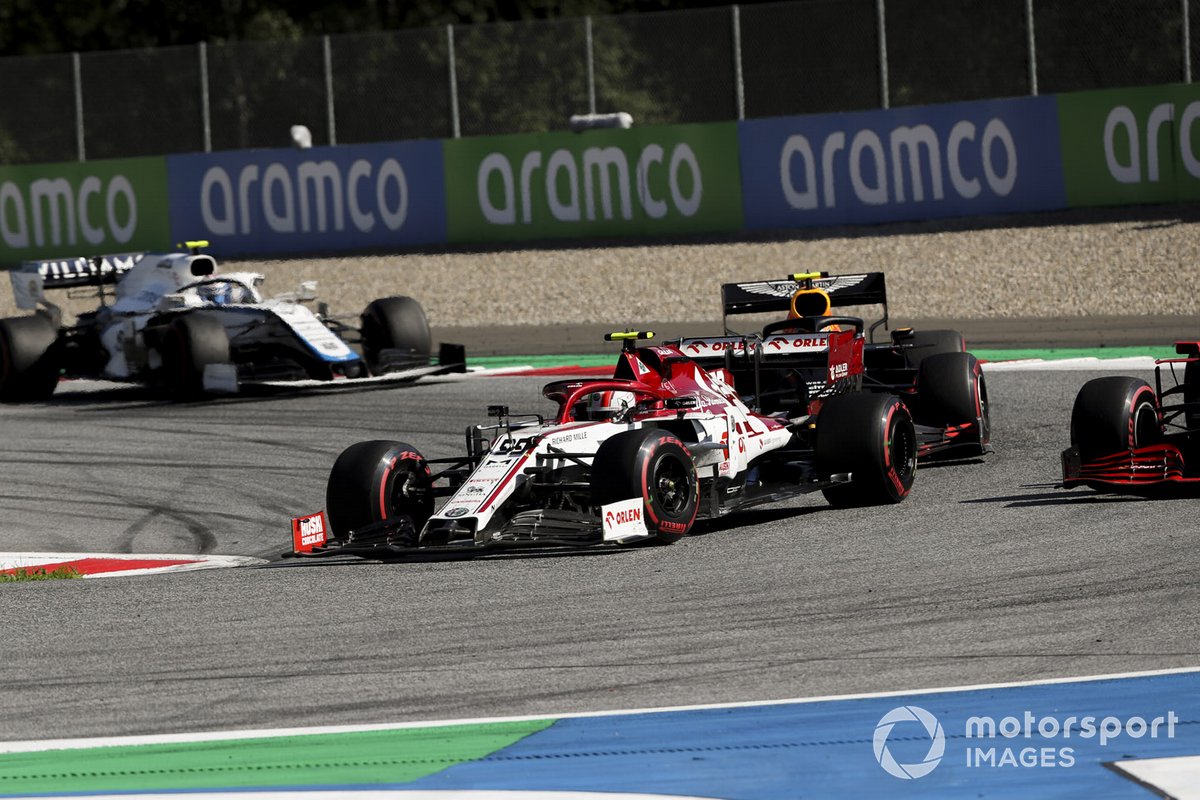 Antonio Giovinazzi, Alfa Romeo Racing C39, leads Alex Albon, Red Bull Racing RB16, and Nicholas Latifi, Williams FW43