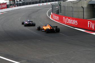 Fernando Alonso, McLaren MCL33 and Pierre Gasly, Scuderia Toro Rosso STR13