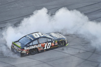 Aric Almirola, Stewart-Haas Racing, Ford Fusion Smithfield Bacon for Life celebrates his win Charlotte Kinrade
