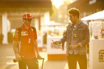 Kimi Raikkonen, Ferrari, signs a an autograph