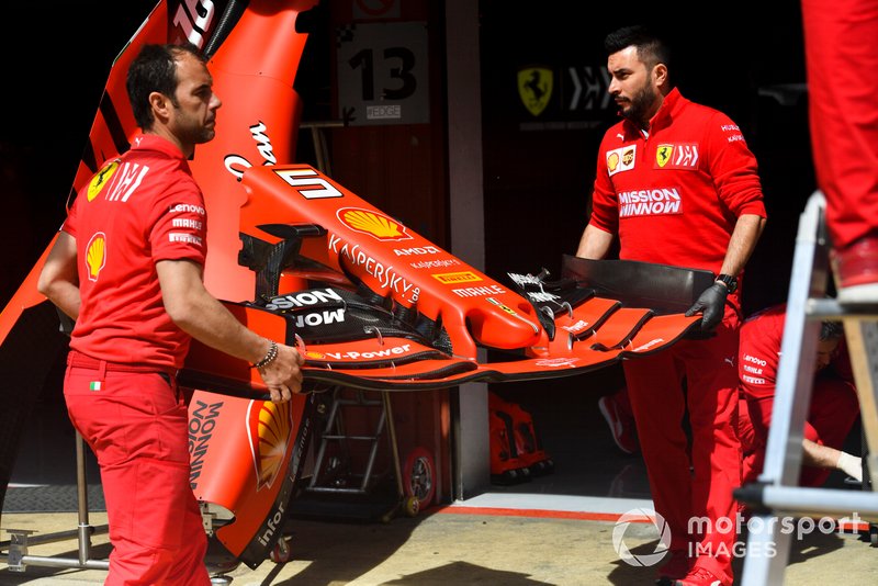 Ferrari SF90 front wing wing carried by Ferrari Mechanics