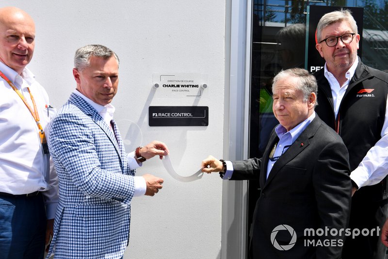 Francois Dumontier, President and CEO, Canadian Grand Prix, Jean Todt, President, FIA, and Ross Brawn, Managing Director of Motorsports, FOM, unveil a plaque dedicating a new Race Control building to the late Charlie Whiting, former FIA Race Director