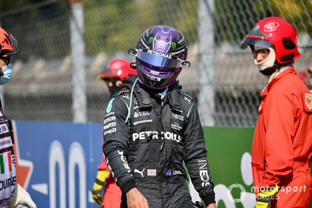 Lewis Hamilton, Mercedes, walks away from the scene of the accident