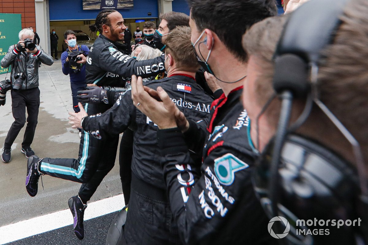 Lewis Hamilton, Mercedes-AMG F1, 1st position, celebrates with his team on arrival in Parc Ferme after securing his seventh world drivers championship title