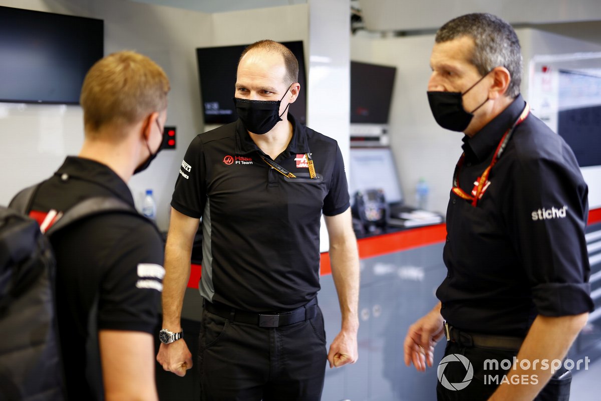 Guenther Steiner, Team Principal, Haas F1 and Mick Schumacher in the garage for his seat fitting