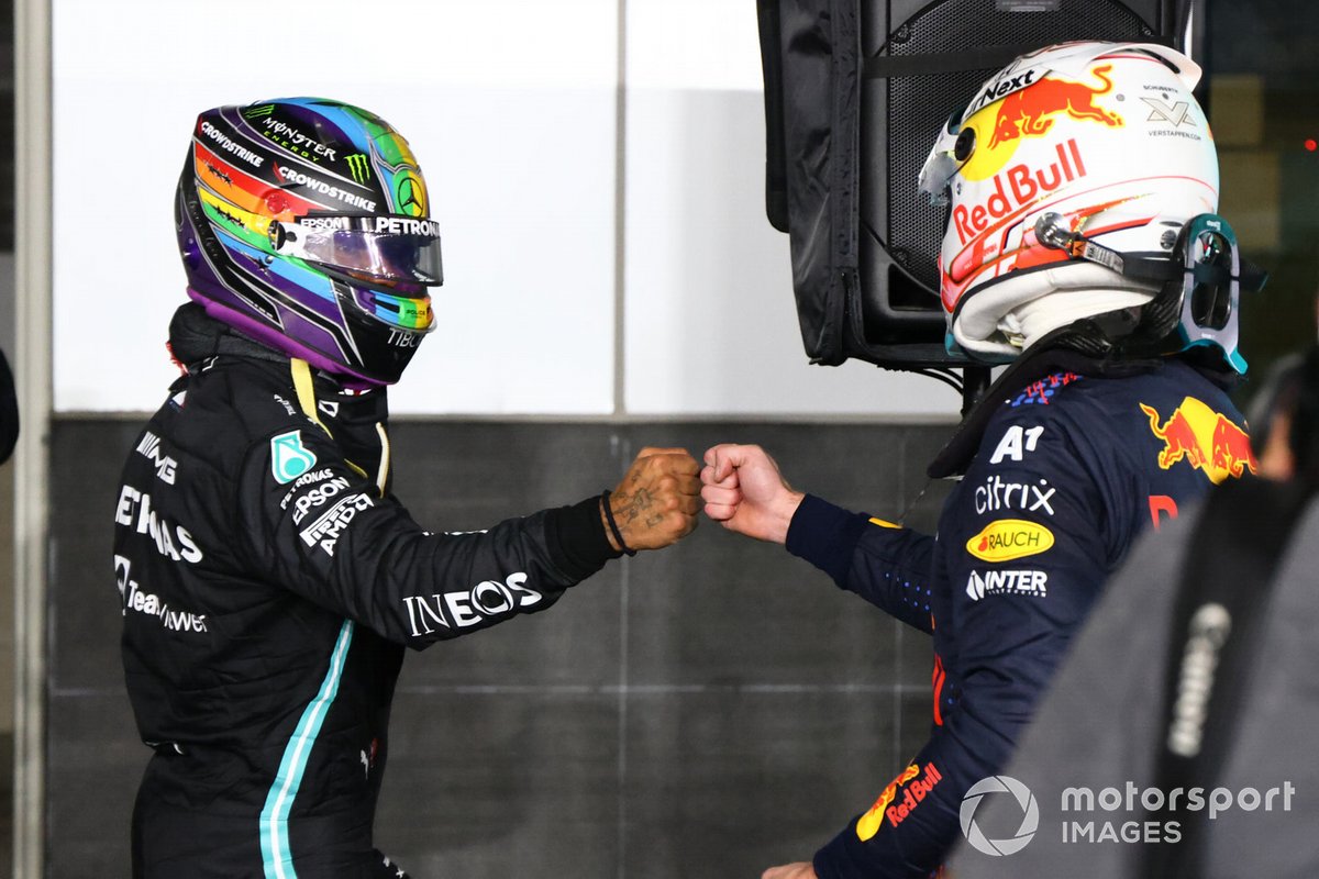 Lewis Hamilton, Mercedes, and Max Verstappen, Red Bull Racing congratulate each other in Parc Ferme