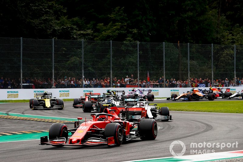 Charles Leclerc, Ferrari SF90 leads Lewis Hamilton, Mercedes W10 and Valtteri Bottas, Mercedes W10 at the second chicane on the first lap