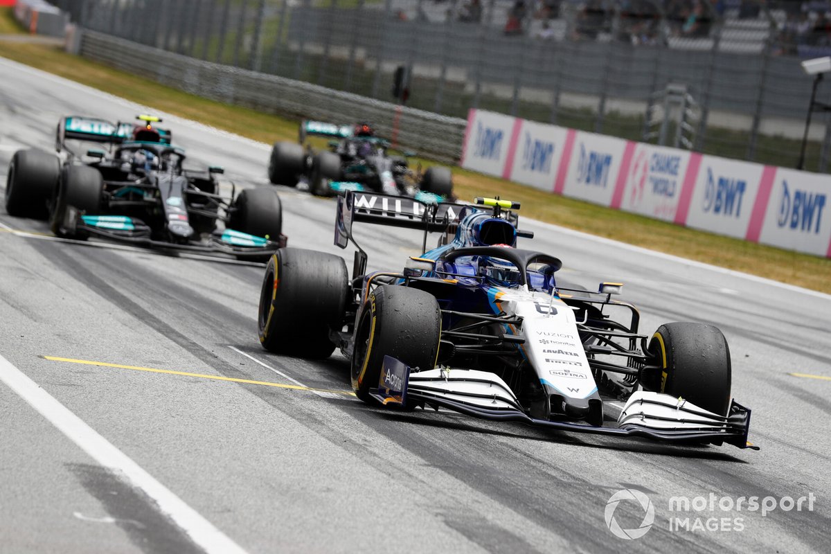 Nicholas Latifi, Williams FW43B, Valtteri Bottas, Mercedes W12, and Lewis Hamilton, Mercedes W12