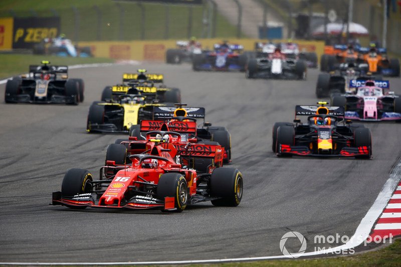 Charles Leclerc, Ferrari SF90, leads Sebastian Vettel, Ferrari SF90, Max Verstappen, Red Bull Racing RB15, Pierre Gasly, Red Bull Racing RB15, and Daniel Ricciardo, Renault F1 Team R.S.19