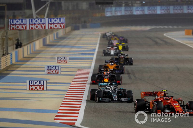 Charles Leclerc, Ferrari SF90,leads Lewis Hamilton, Mercedes AMG F1 W10, Max Verstappen, Red Bull Racing RB15, and Carlos Sainz Jr., McLaren MCL34