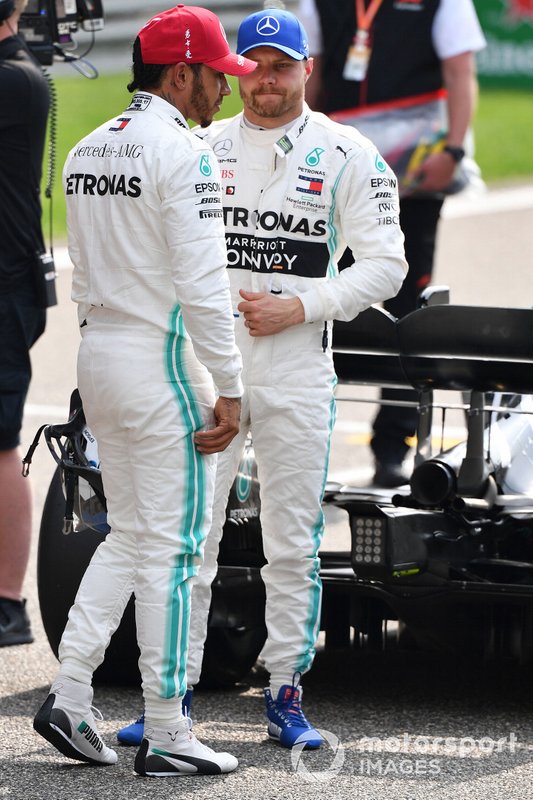 Lewis Hamilton, Mercedes AMG F1, and pole sitter Valtteri Bottas, Mercedes AMG F1, on the grid