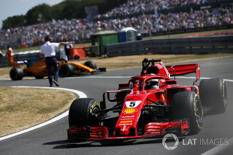 Race winner Sebastian Vettel, Ferrari SF71H, celebrates on his way to Parc Ferme