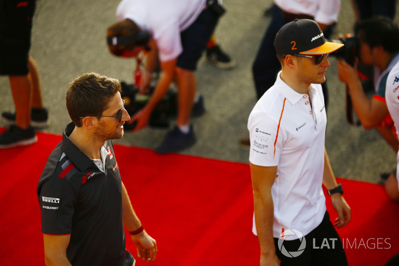 Stoffel Vandoorne, McLaren, and Romain Grosjean, Haas F1 Team, in the drivers parade