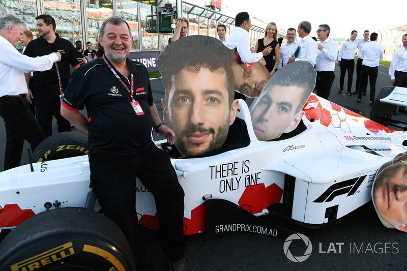 Paul Stoddart, with F1 Experiences 2-Seater and cardboard cut out faces of Daniel Ricciardo, Red Bul