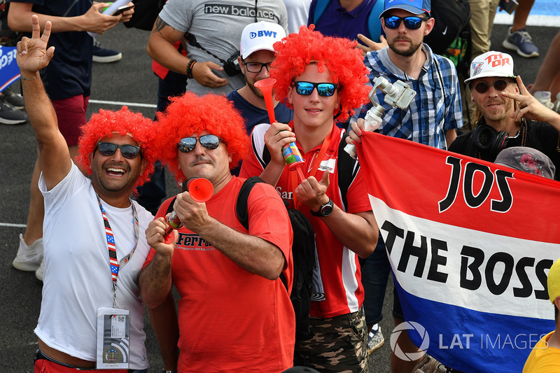 Max Verstappen, Red Bull Racing fans and banners