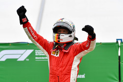 Race winner Sebastian Vettel, Ferrari celebrates in parc ferme