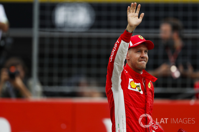 Sebastian Vettel, Ferrari, celebrates his pole position