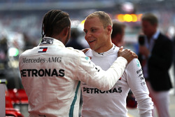 Lewis Hamilton, Mercedes AMG F1, celebrates victory in parc ferme, with Valtteri Bottas, Mercedes AMG F1