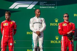 Sebastian Vettel, Ferrari, Lewis Hamilton, Mercedes-AMG F1 and Kimi Raikkonen, Ferrari celebrate on the podium 