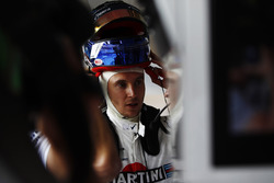 Sergey Sirotkin, Williams Racing, puts on his helmet in the garage