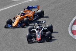 Romain Grosjean, Haas F1 Team VF-18 and Fernando Alonso, McLaren MCL33