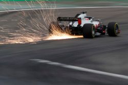 Romain Grosjean, Haas F1 Team VF-18 Ferrari, srikes up sparks