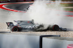 Romain Grosjean, Haas VF-17, spins into the gravel