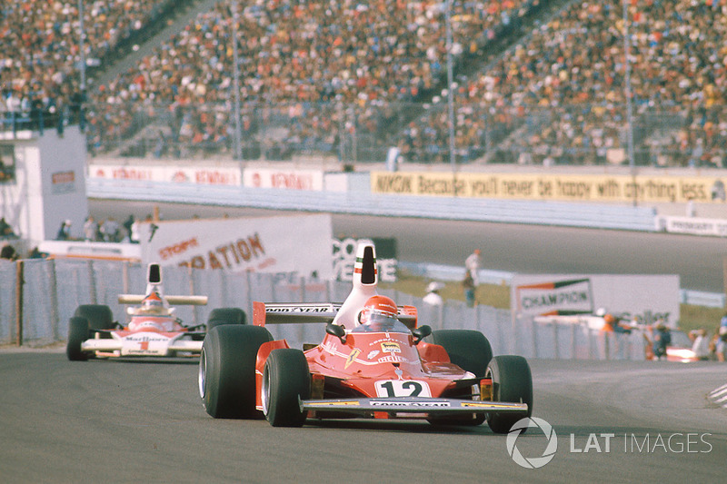 Niki Lauda, Ferrari 312T, Emerson Fittipaldi, McLaren M23 Ford