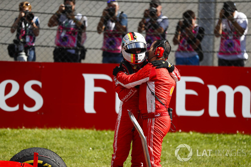 Sebastian Vettel, Ferrari, 3rd position, with his engineer in Parc Ferme